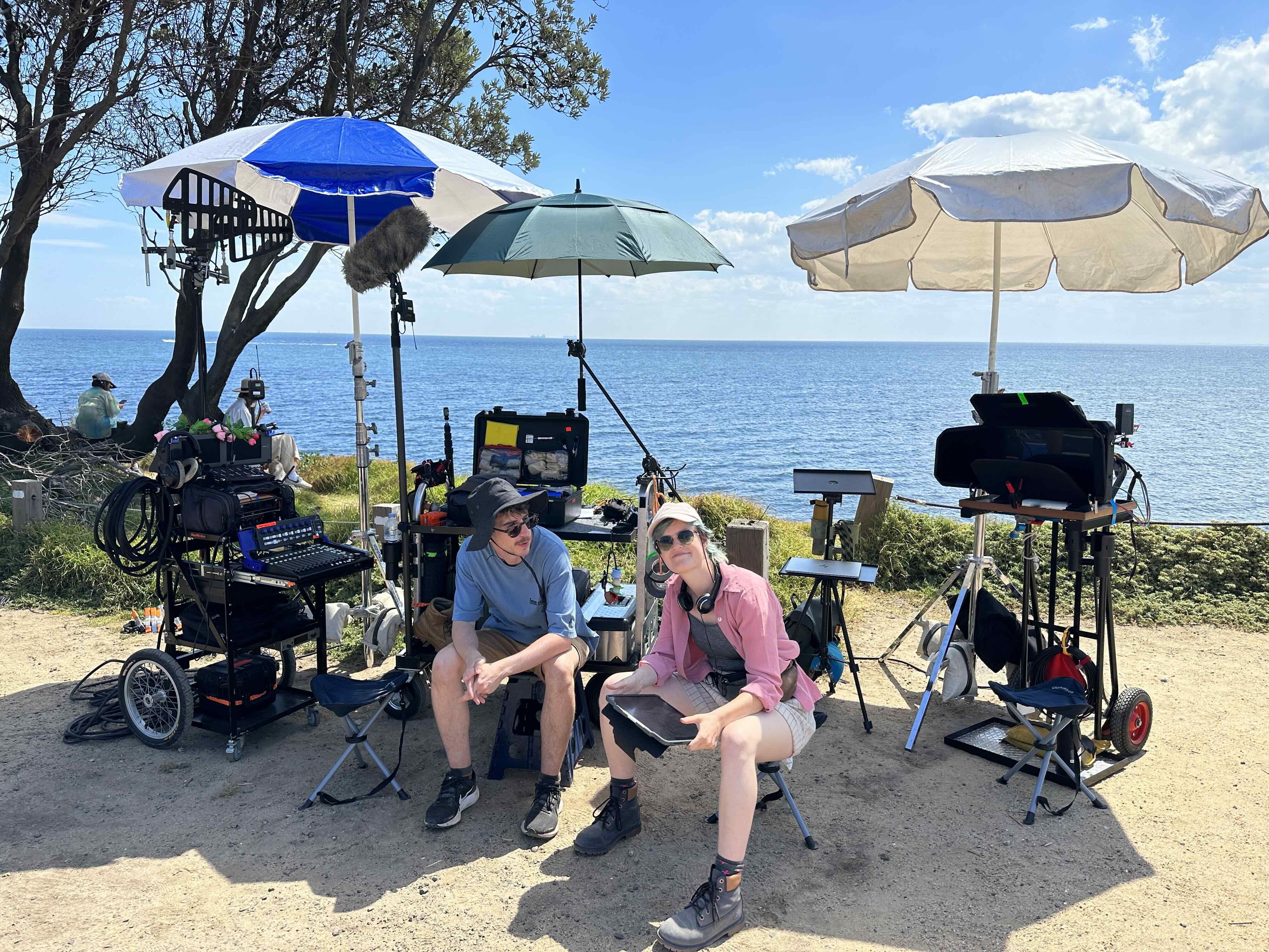 Boom Operator and Script Supervisor on set of indie film 'Strange Creatures' - location sound setup.
